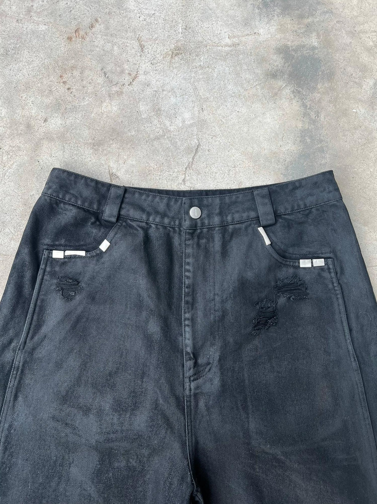 WIDE LEG DESTROYED WAXED JEANS