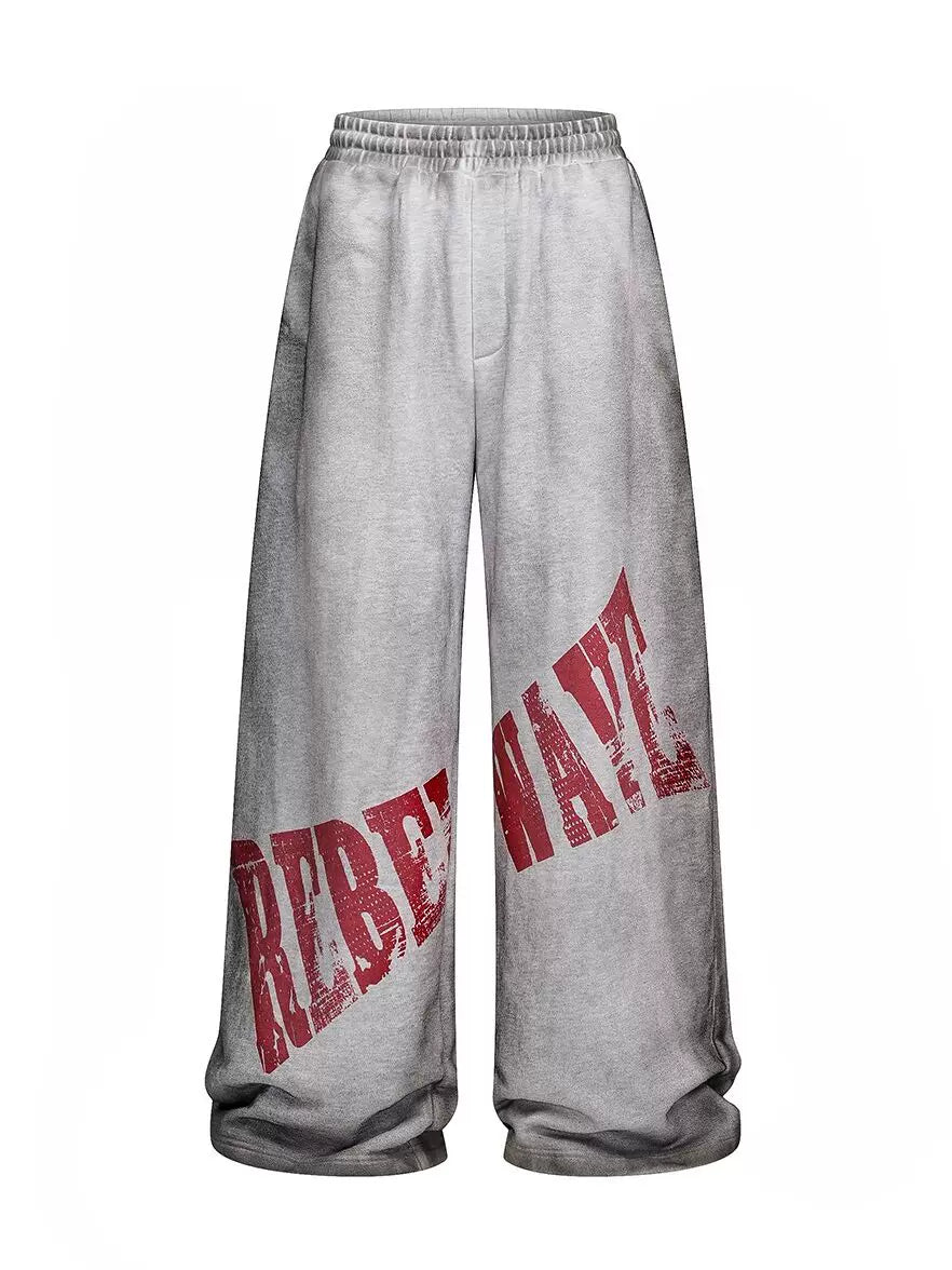 REVERSIBLE SLOGAN SWEATPANTS