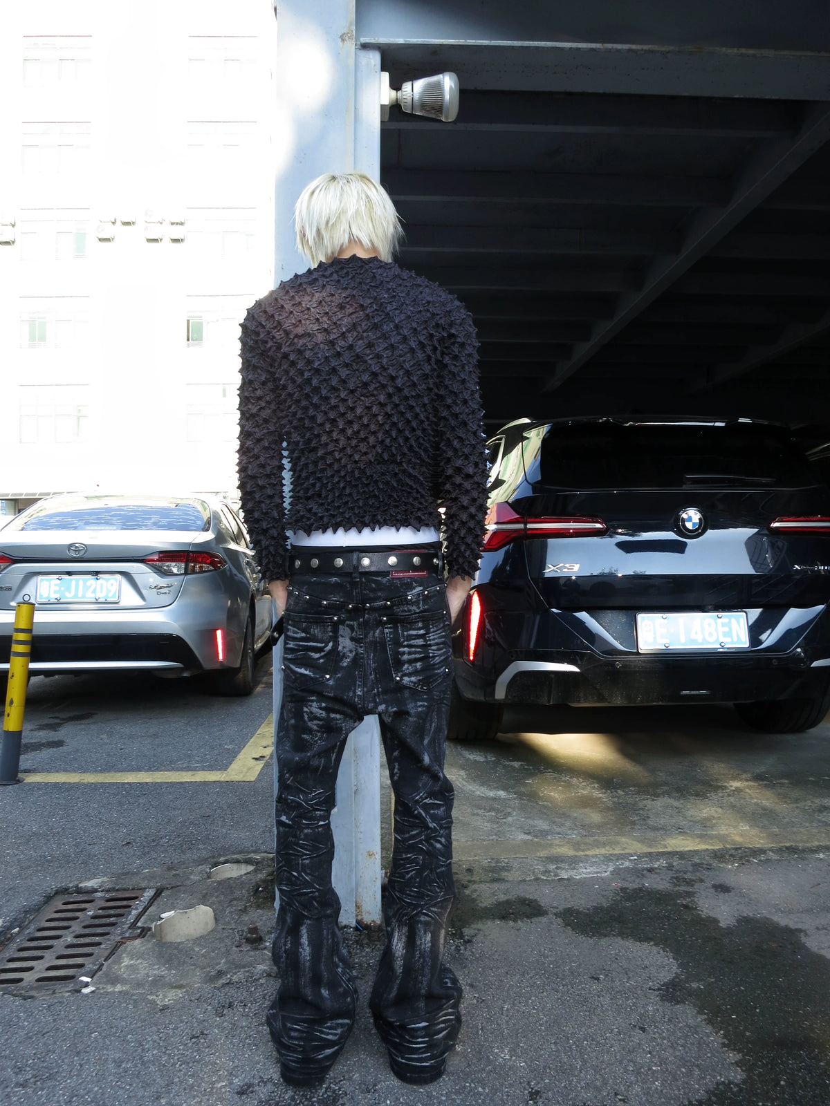 DISTRESSED RESIN COATED JEANS