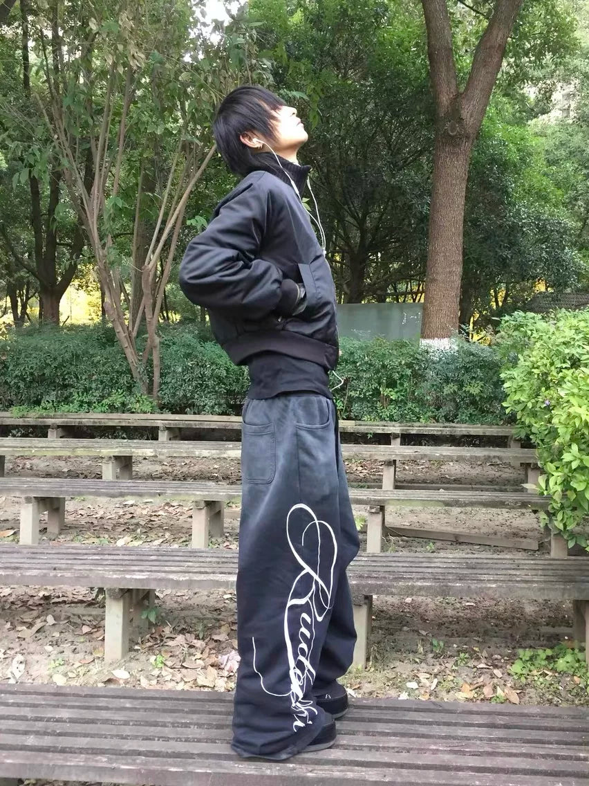SUN-WASHED EMBROIDERED SWEATPANTS