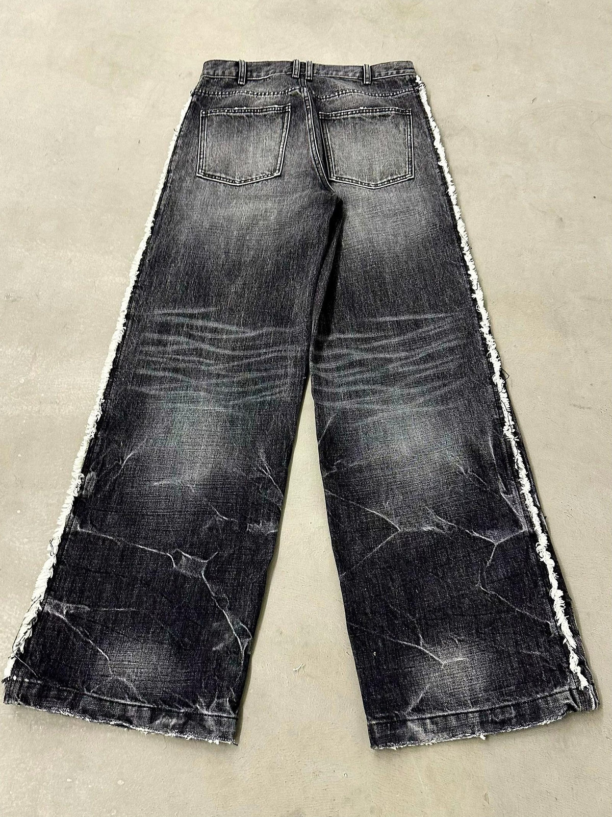 LIGHTNING STRIPE RAW EDGE JEANS