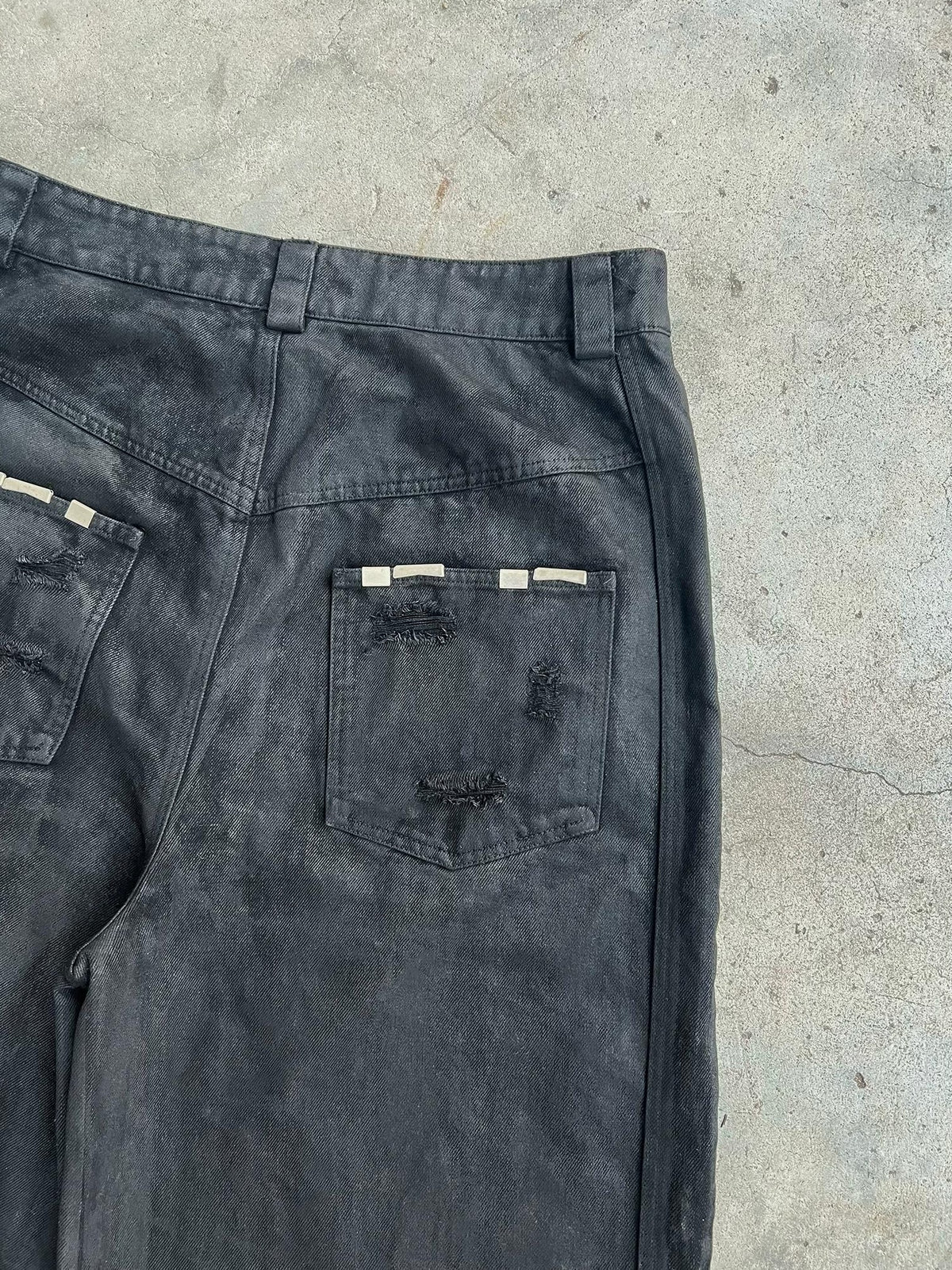 WIDE LEG DESTROYED WAXED JEANS