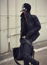 STUDDED CROSS BELT WITH BURST PATTERN