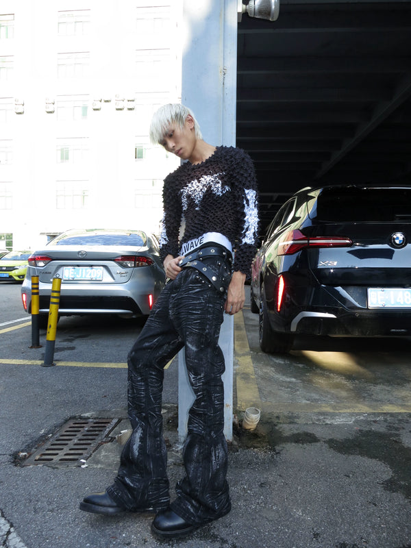 DISTRESSED RESIN COATED JEANS