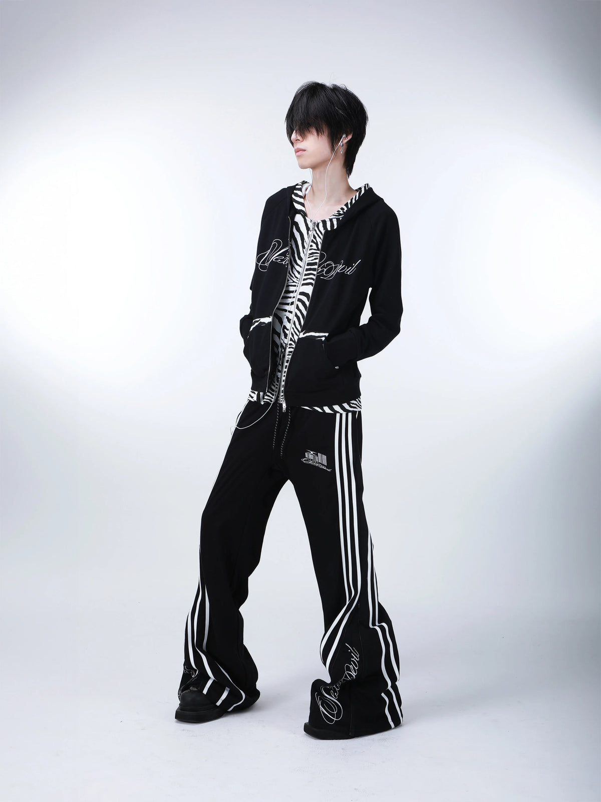 DECONSTRUCTED ZIPPER STRIPED SWEATPANTS