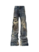 DISTRESSED DENIM JEANS WITH INK SPLATTER