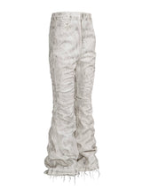 DISTRESSED WAXED MICRO JEANS