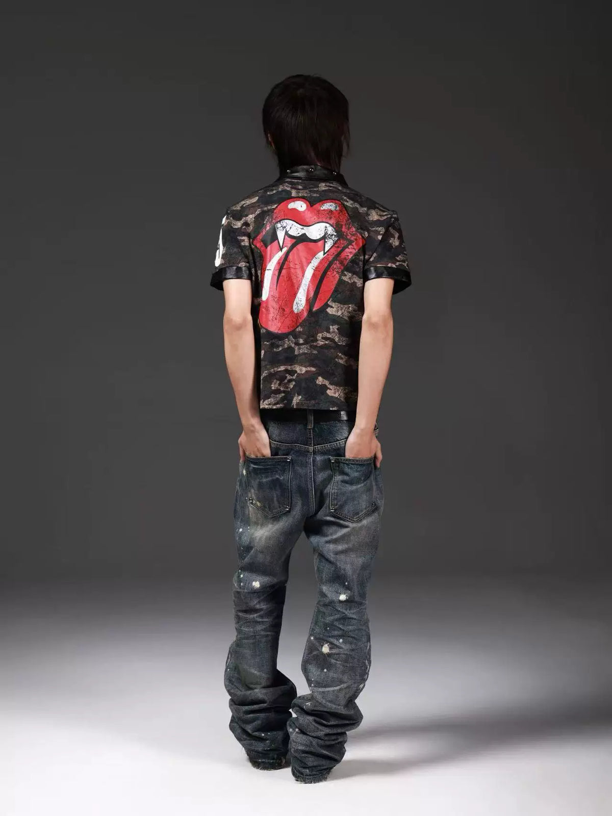DISTRESSED DENIM JEANS WITH INK SPLATTER