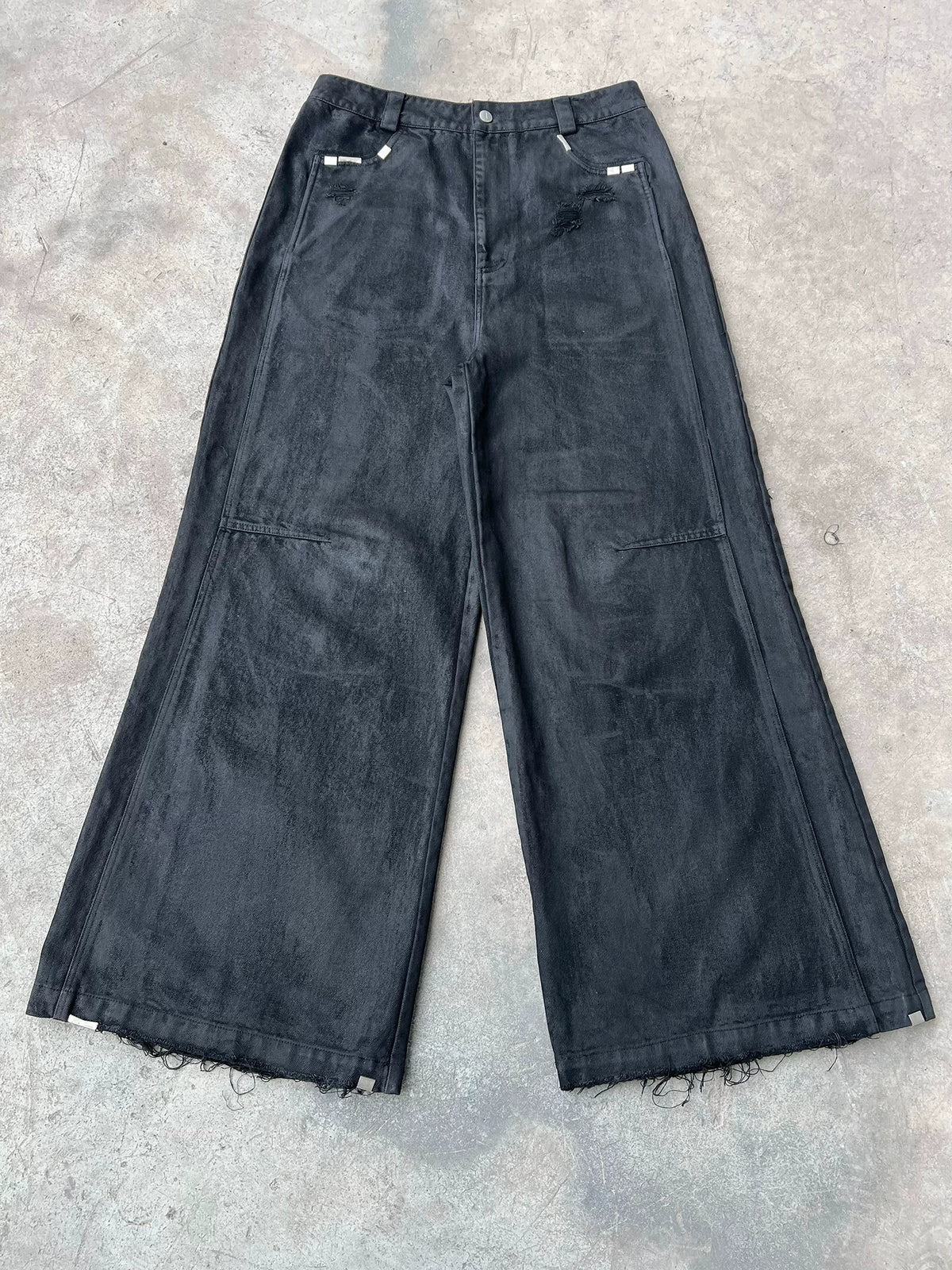 WIDE LEG DESTROYED WAXED JEANS