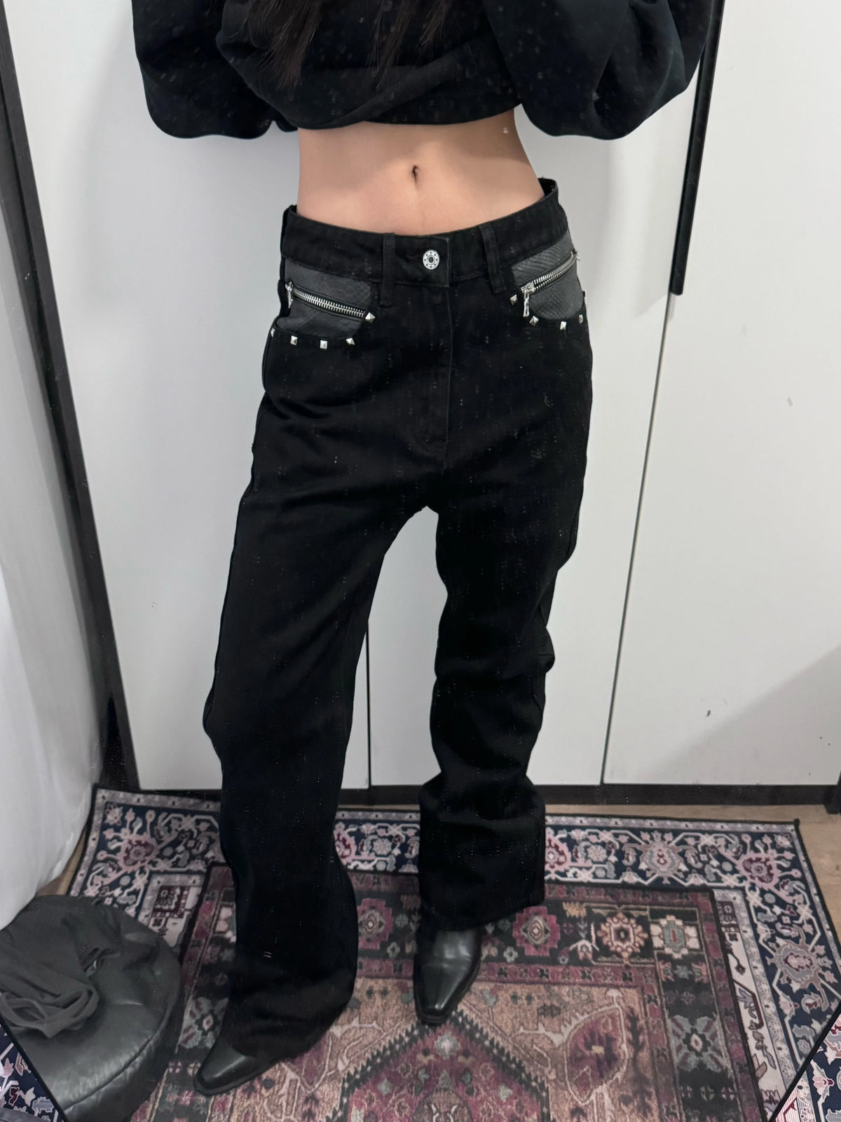 ASYMMETRICAL SNAKE-PRINT JEANS
