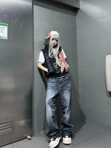 DISTRESSED PLEATED STRAIGHT-LEG JEANS