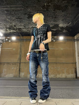DISTRESSED PLEATED STRAIGHT-LEG JEANS