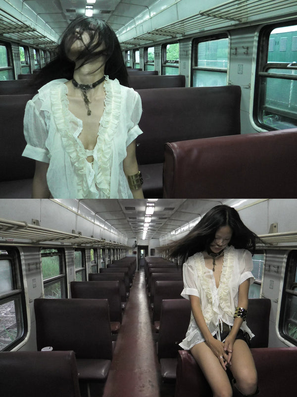 IRREGULAR HEM RUFFLE SHIRT