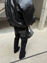 ASYMMETRICAL SNAKE-PRINT JEANS