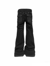ASYMMETRICAL SNAKE-PRINT JEANS