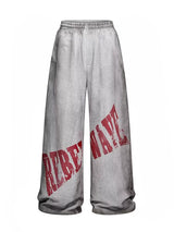 REVERSIBLE SLOGAN SWEATPANTS