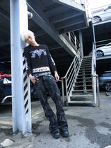 DISTRESSED RESIN COATED JEANS