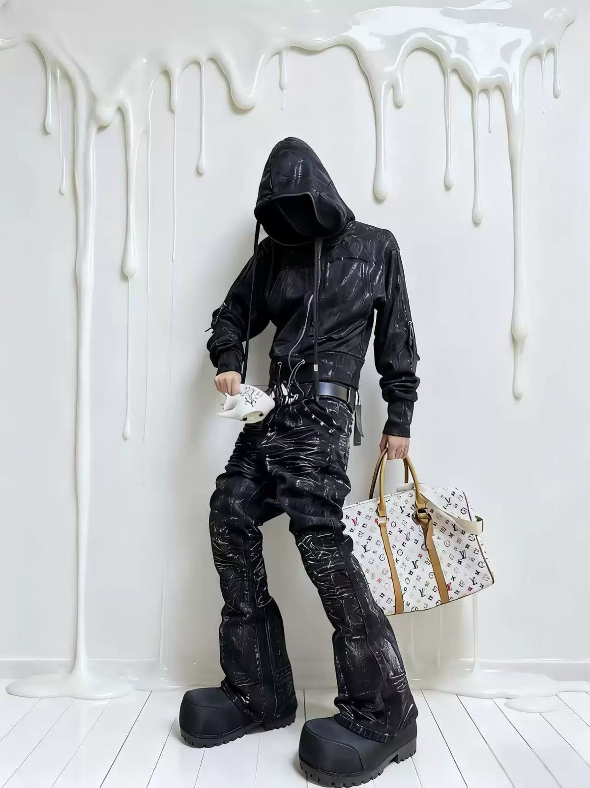 DISTRESSED RESIN COATED JEANS