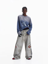 EMBROIDERED WIDE-LEG SWEATPANTS