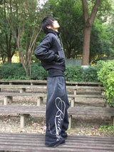 SUN-WASHED EMBROIDERED SWEATPANTS