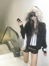 FUR HOODED SWEATSHIRT WITH TASSELS