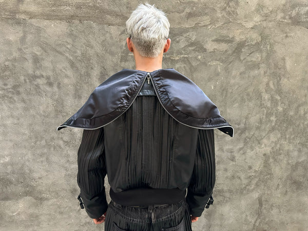 PLEATED LEATHER HOODED JACKET