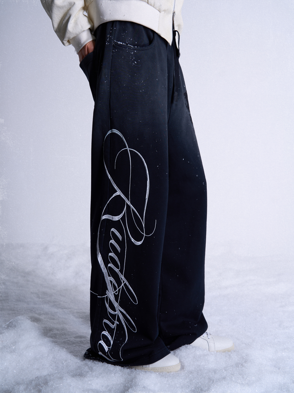 SUN-WASHED EMBROIDERED SWEATPANTS