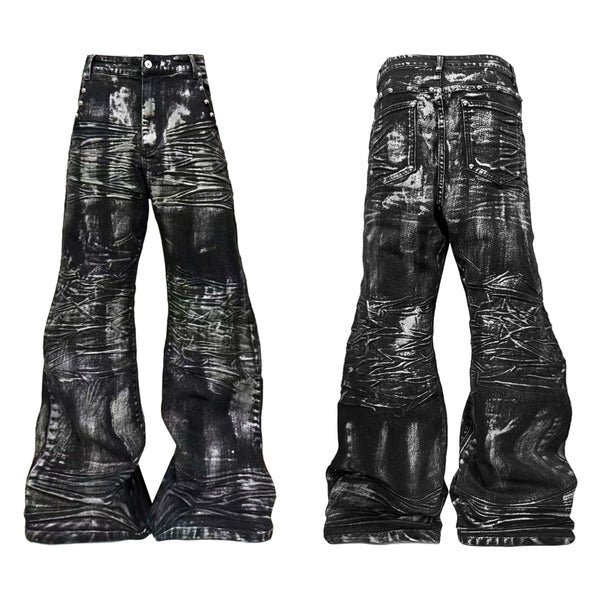 DISTRESSED RESIN COATED JEANS