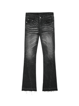 DISTRESSED FRINGE JEANS