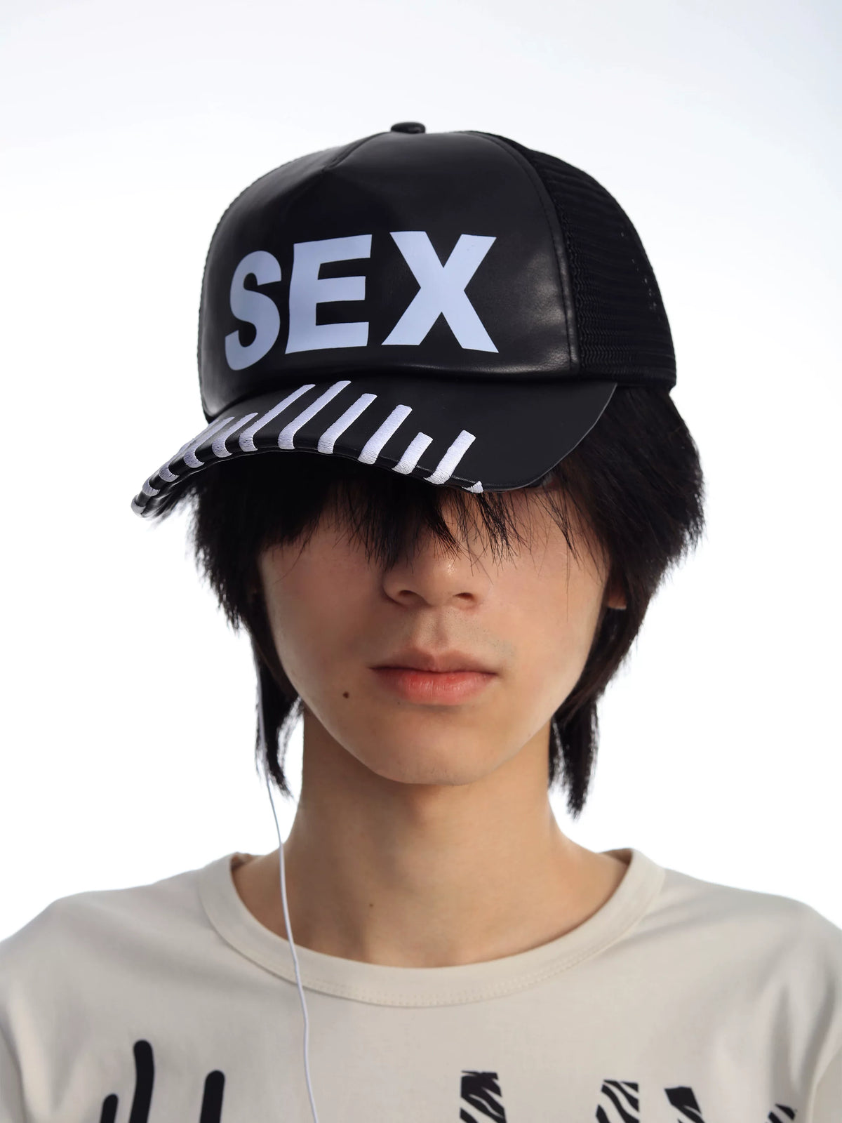 PARTY CAP WITH RHYTHM DESIGN