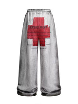 REVERSIBLE SLOGAN SWEATPANTS