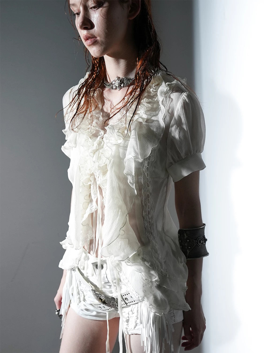 IRREGULAR HEM RUFFLE SHIRT
