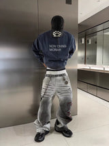 GRADIENT STACKED BAGGY JEANS