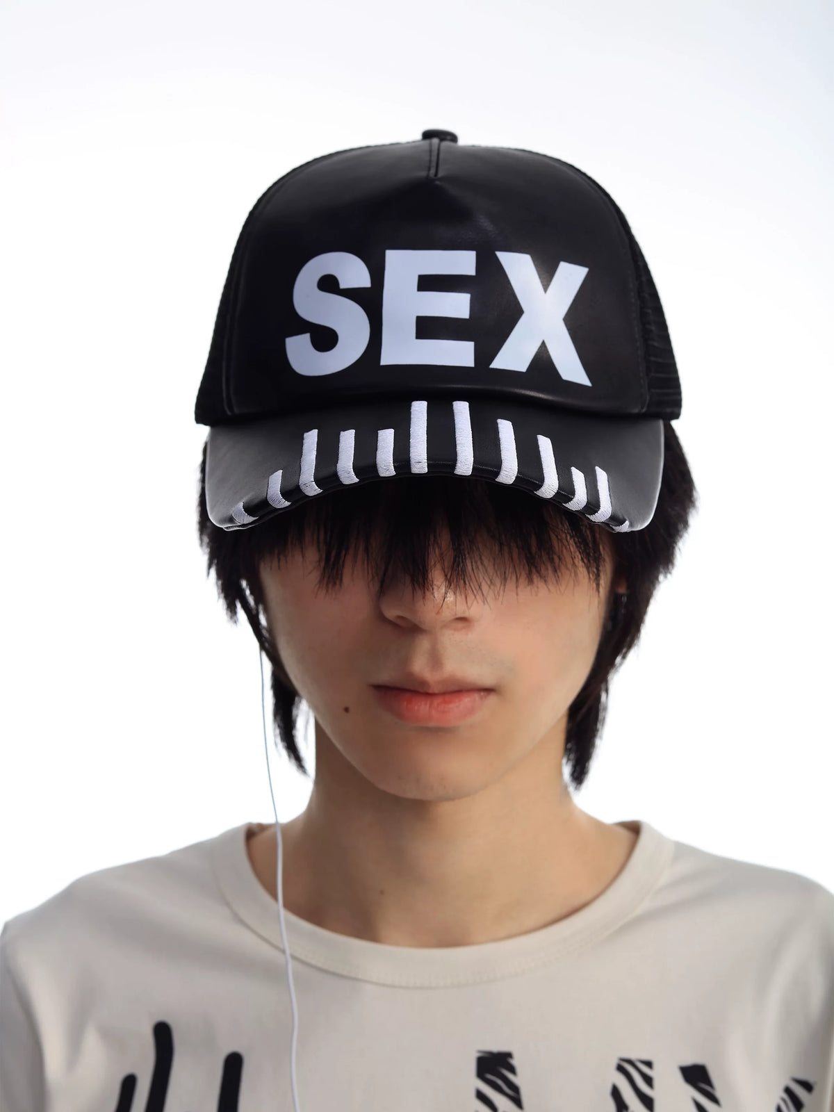 PARTY CAP WITH RHYTHM DESIGN