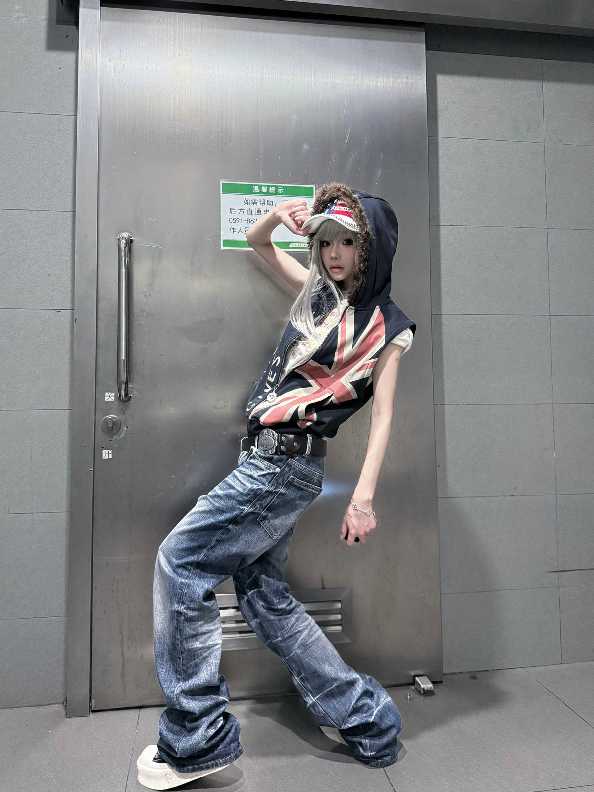 DISTRESSED PLEATED STRAIGHT-LEG JEANS