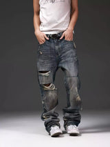 DISTRESSED DENIM JEANS WITH INK SPLATTER