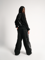 NOE CROSSBODY EMBROIDERED SWEAT PANTS
