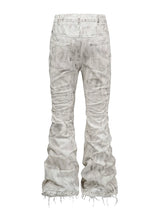 DISTRESSED WAXED MICRO JEANS