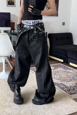 WIDE LEG DESTROYED WAXED JEANS