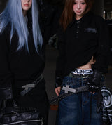 STUDDED CROSS BELT WITH BURST PATTERN