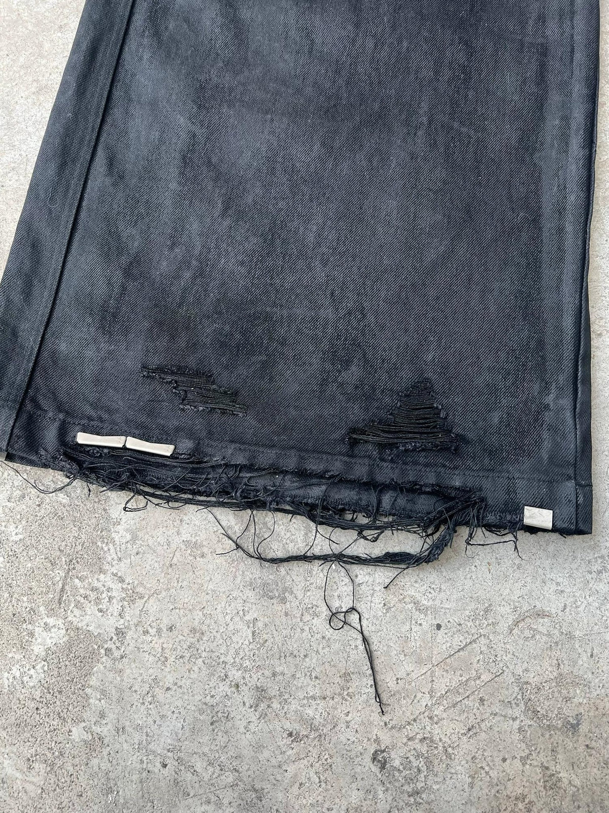 WIDE LEG DESTROYED WAXED JEANS