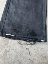 WIDE LEG DESTROYED WAXED JEANS