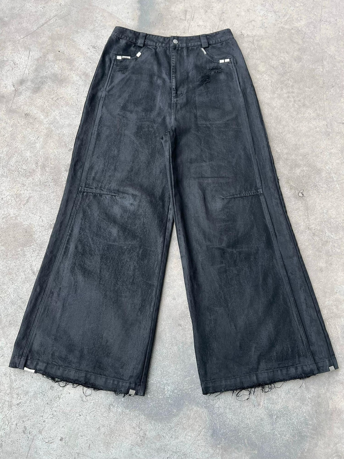 WIDE LEG DESTROYED WAXED JEANS