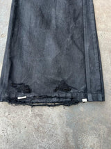 WIDE LEG DESTROYED WAXED JEANS