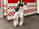 REVERSIBLE SLOGAN SWEATPANTS